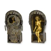 A BRONZE SCULPTURE OF A FEMALE NUD EIN BEACH CHAIR A BRONZE SCULPTURE OF A FEMALE NUD EIN BEACH CHAIR