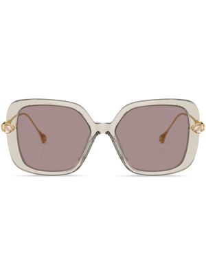 Swarovski Eyewear lunettes de soleil oversize à détails de cristaux - Marron