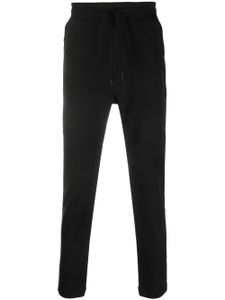 C.P. Company pantalon de jogging en coton stretch à patch logo - Noir