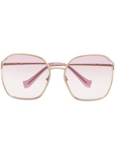 Miu Miu Eyewear lunettes de soleil à monture carrée oversize - Or