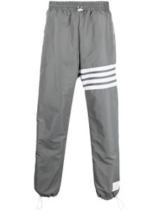 Thom Browne pantalon de jogging à détails 4 bandes signature - Gris