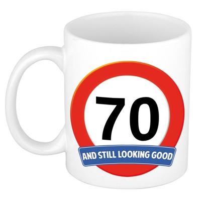 Bellatio Decoration Koffiemok - 70 jaar verjaardag - still looking good - 300 ml - wit