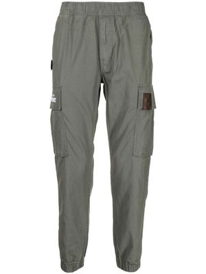 AAPE BY *A BATHING APE® pantalon cargo à taille élastiquée - Vert