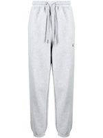 A BATHING APE® pantalon de jogging en coton à patch logo - Gris