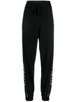 Moncler pantalon de jogging à bande logo - Noir