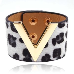 Brede Dames Armband Verstelbaar Dierenprint Goud en Wit