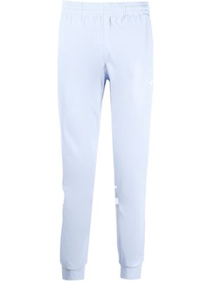 adidas pantalon de jogging à bandes contrastantes - Violet