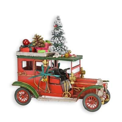 A TIN MODEL OF AN OLDTIMER IN CHRISTMAS STYLE
