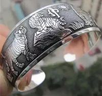 Zilverkleurige Tibetaanse Manchet Armband met Tijgers - Sieraden - Spiritueelboek.nl