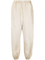 Maison MIHARA YASUHIRO pantalon de jogging à détails rayés - Tons neutres