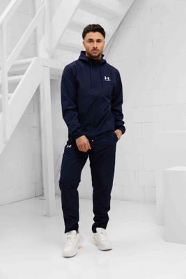 Under Armour Rival Woven Trainingspak Heren Donkerblauw - Maat M - Kleur: Donkerblauw | Soccerfanshop