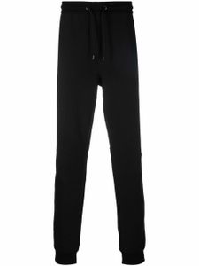 Calvin Klein pantalon de jogging à logo imprimé - Noir