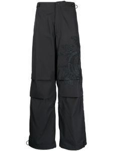 Maharishi pantalon ample à imprimé graphique - Noir