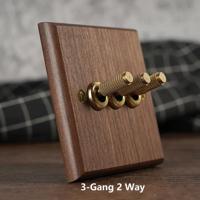 RetroLux Zwart Walnoot 1-4 Gang Wandschakelaar met Messing Toggle