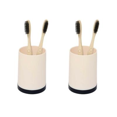Badkamer tandenborstelhouder/drinkbeker - 2x - kunststof - beige/zwart - 8 x 10 cm