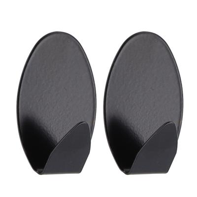Plakhaakjes ovaal - 2x stuks?- 3 x 2,5 x 5 cm - Zelfklevende ophang haakjes - RVS - zwart
