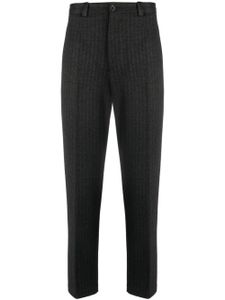 Dolce & Gabbana pantalon fuselé à motif de chevrons - Noir