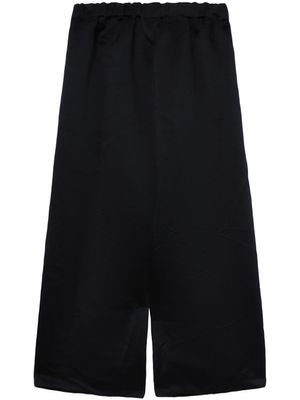 Comme Des Garçons Comme Des Garçons pantalon ample à coupe courte - Bleu