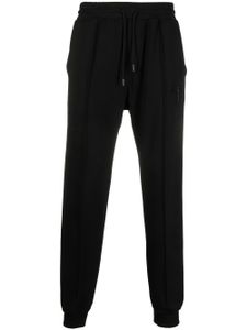 Giuseppe Zanotti pantalon de jogging à logo strassé - Noir