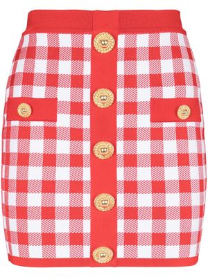 Balmain minijupe en maille fine à carreaux vichy - Rouge