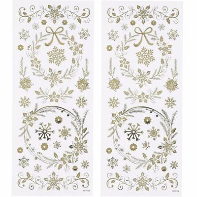 Sneeuwvlokken Stickervel - 58x gouden stickers - kerst decoraties