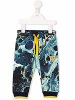 Dolce & Gabbana Kids pantalon de jogging à imprimé abstrait - Bleu