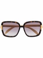 Gucci Eyewear lunettes de soleil à effet écaille de tortue - Tons neutres