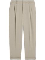 AMI Paris pressed-crease pleated tapered trousers - Tons neutres