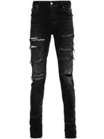 AMIRI jean skinny à effet usé - Noir