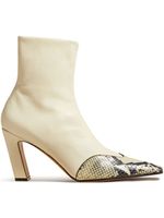 KHAITE The Dallas embossed python-print boots - Tons neutres