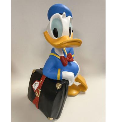 Donald Duck Met Tas Beeld Donald Duck Met Tas Beeld