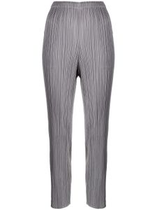 Pleats Please Issey Miyake pantalon slim à design plissé - Gris