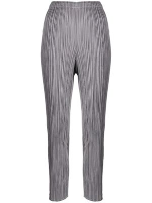 Pleats Please Issey Miyake pantalon court à design plissé - Gris