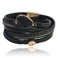 Zwarte leren dames armband van hars met hartvormige steen
