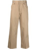 Neighborhood logo-patch wide-leg trousers - Tons neutres