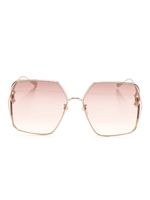 Gucci Eyewear lunettes de soleil carrées à logo GG - Rose - thumbnail