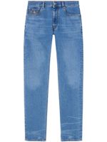 Versace jean slim à ornement Medusa Head - Bleu