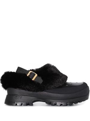Stella McCartney mules Trace à fourrure artificielle - Noir