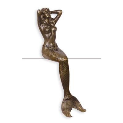 A CAST IRON SCULPTURE OF A MERMAID