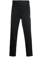 Moncler pantalon de jogging à patch logo - Noir