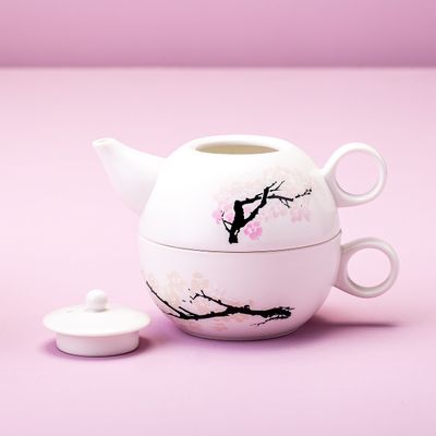 Warmtegevoelige bloesem theepot en kop