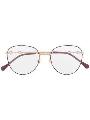 Gucci Eyewear lunettes de vue à monture ronde - Or
