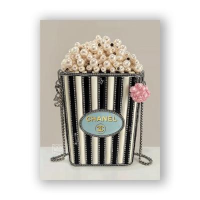 Glasschilderij - Chanel popcorn zwart wit - 60 x 80 cm