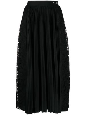Valentino Garavani jupe mi-longue à design plissé - Noir