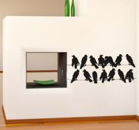 Sticker vogels op electriciteitskabels