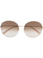 Gucci Eyewear lunettes de soleil métallisées à monture ronde - Or Gucci Eyewear lunettes de soleil métallisées à monture ronde - Or