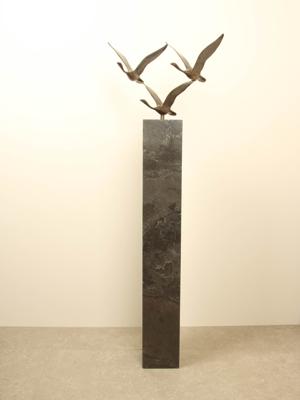 3 bronzen zwanen