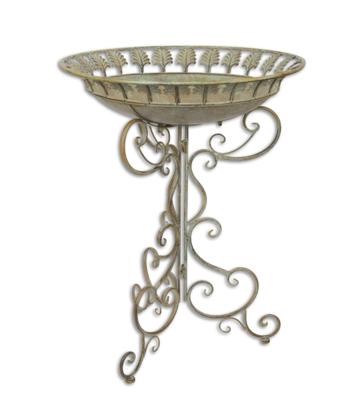 AN IRON BIRD BATH ON STAND