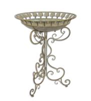 AN IRON BIRD BATH ON STAND