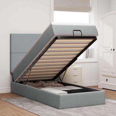 Ottoman bed met matras en LED's 100x200cm stof lichtgrijs